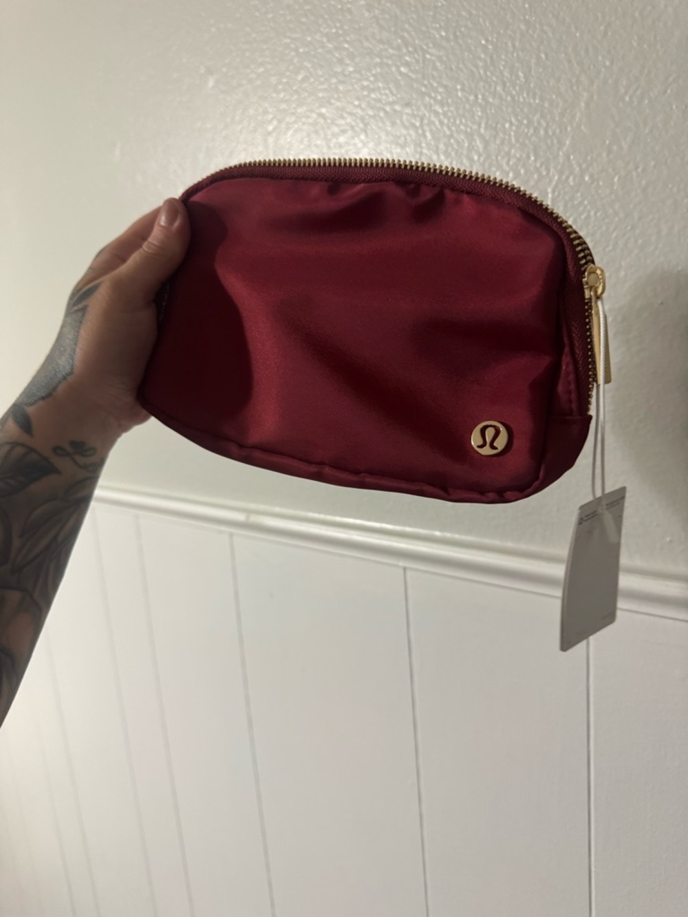 lululemon athletica Wine Red Cosmetic Pouch with Gold Accents
